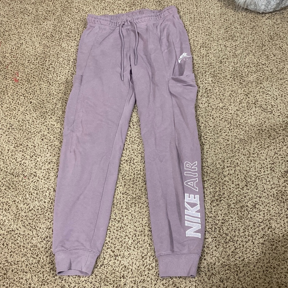 purple Nike sweatpants